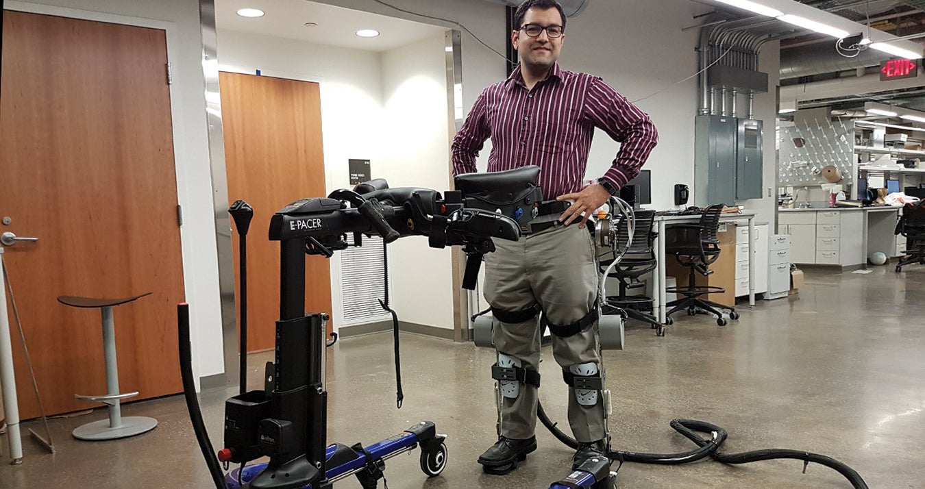 Sharma wearing exoskeleton