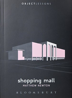 Book cover of Shopping Mall, black background with pink indoor mall structure